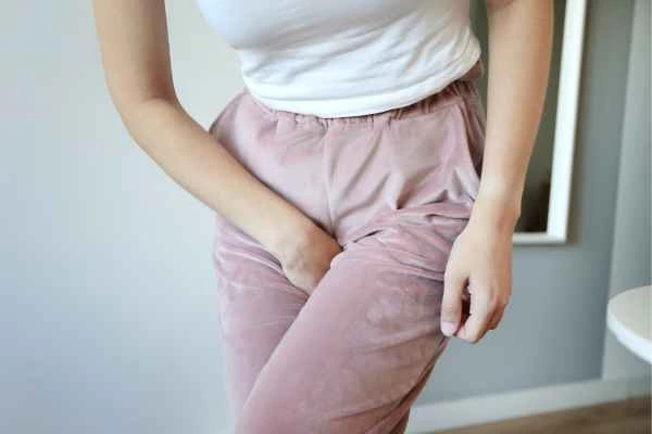 older woman running to the toilet because of urinary incontinence Aylesbury