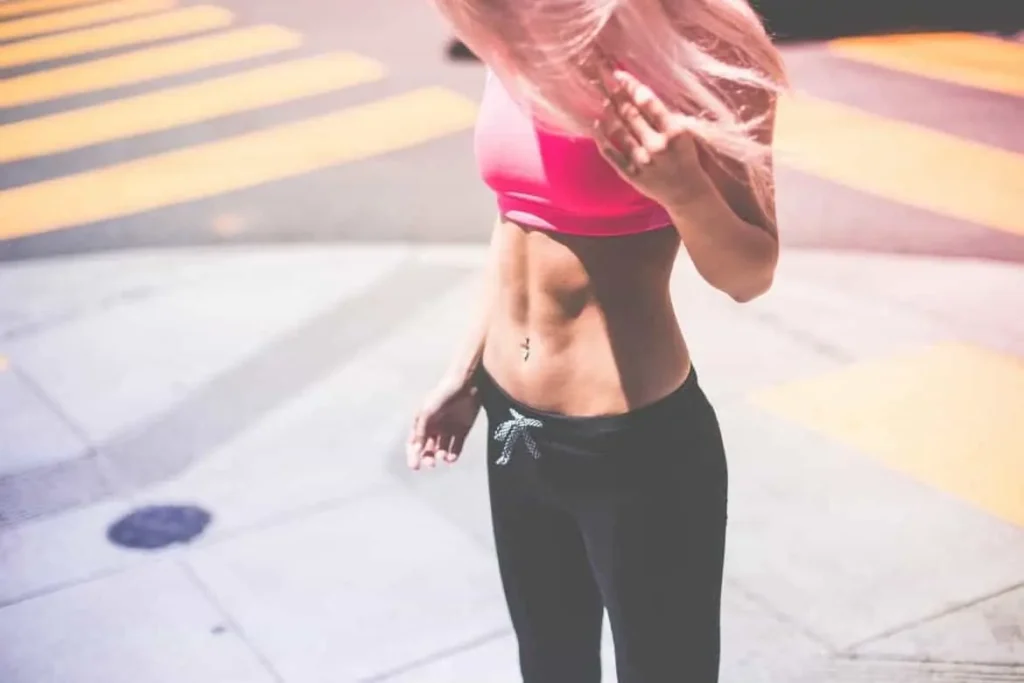 Woman with toned stomach after LA-EMS Body Sculpting Treatment Aylesbury